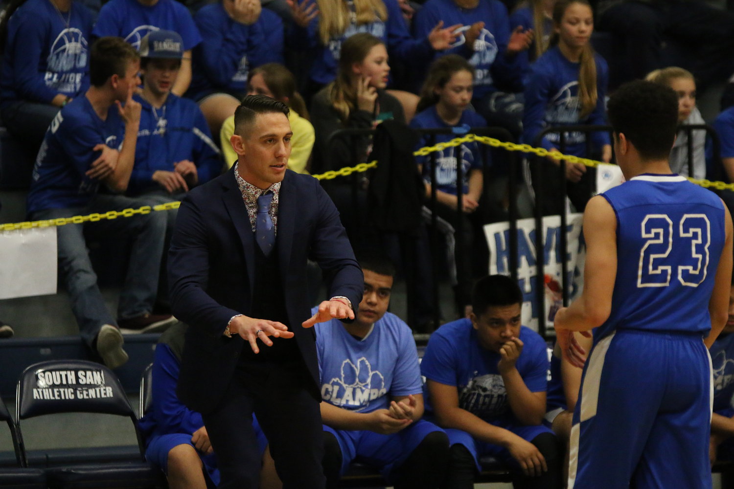 Head coach David Graves gives instructions to one of his players in Waelder’s 66-52 victory on Tuesday.