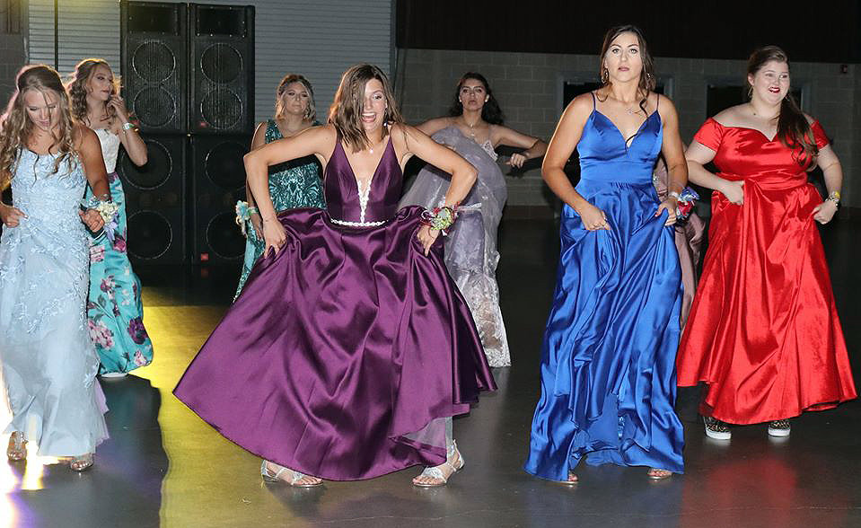 Dancing to Footloose are, from the left, Peyton Ruddock, Sam Barnick, Hayley Sample, and Lindsey Low.