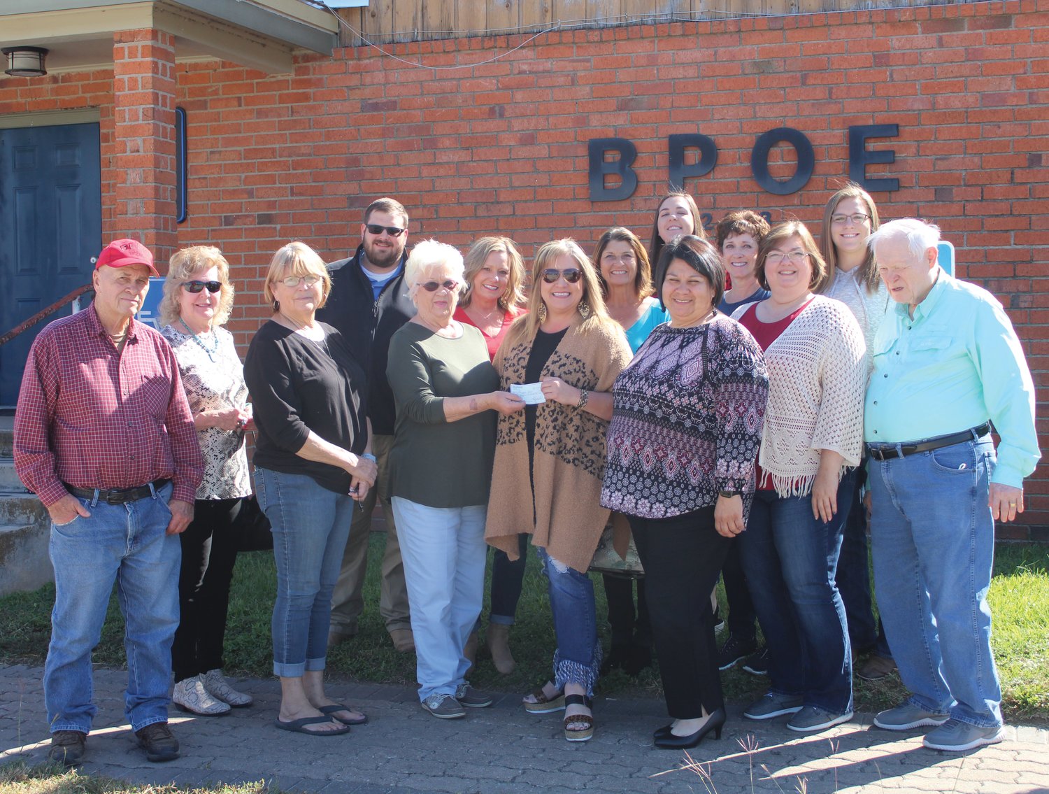 shown presenting a check in the amount of $1500 to Norma’s House are Joe Kotwig, Mary Ann Day, Lori Behlen and Shirley Breitschopf. Receiving check on behalf of Norma’s House are Kim Davis, Joe Pat Nance, Debbie Fougerat, Kathy Schumacher and Charlie Mills, Judy Parks, Tanya Torres, Ashley Schurig and Barbara Stevenson and Deane Parsley-Novosad.