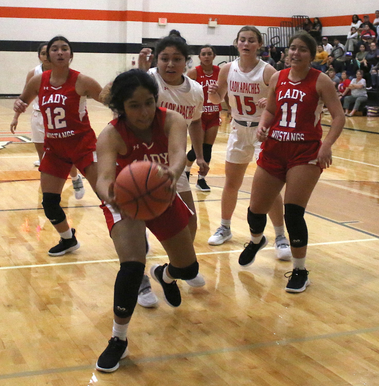 Deanna Amaya snags a loose-ball rebound against Gonzales in a game last week.