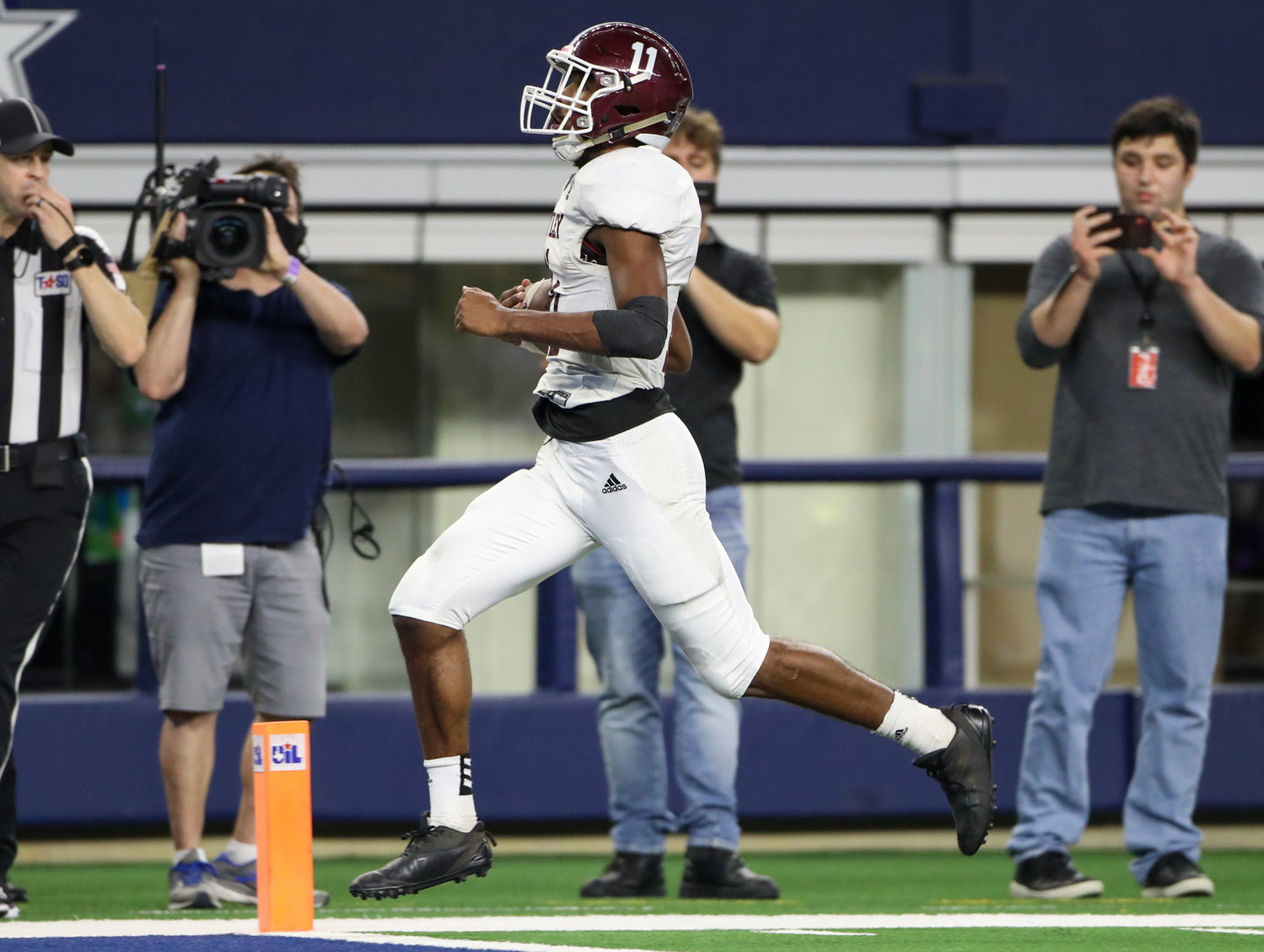 Hawley Bearcats sophomore Diontay Ramon (11) crosses the goal line for a touchdown during the Class 2A Division I state football championship game between Shiner and Hawley on December 15, 2021 in Arlington, Texas.
