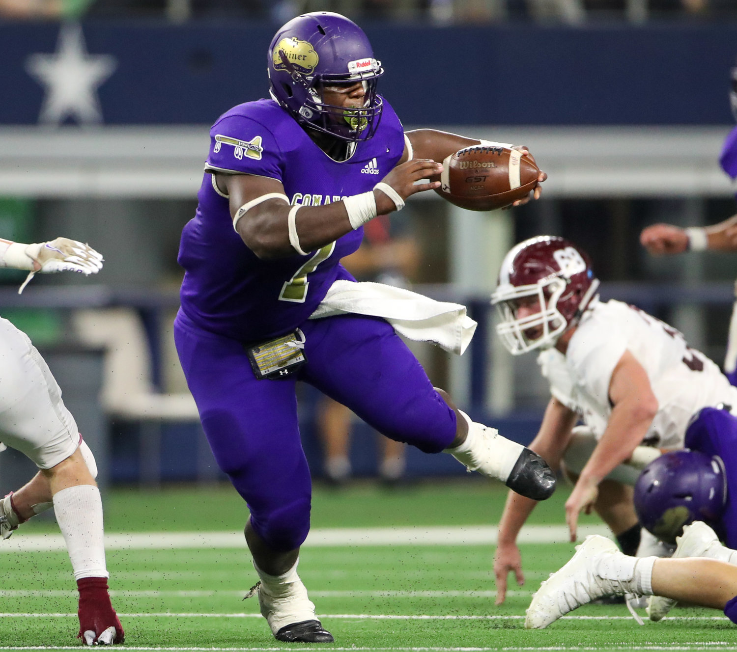Shiner Comanches senior Doug Brooks (1) carries the ball during the Class 2A Division I state football championship game between Shiner and Hawley on December 15, 2021 in Arlington, Texas.