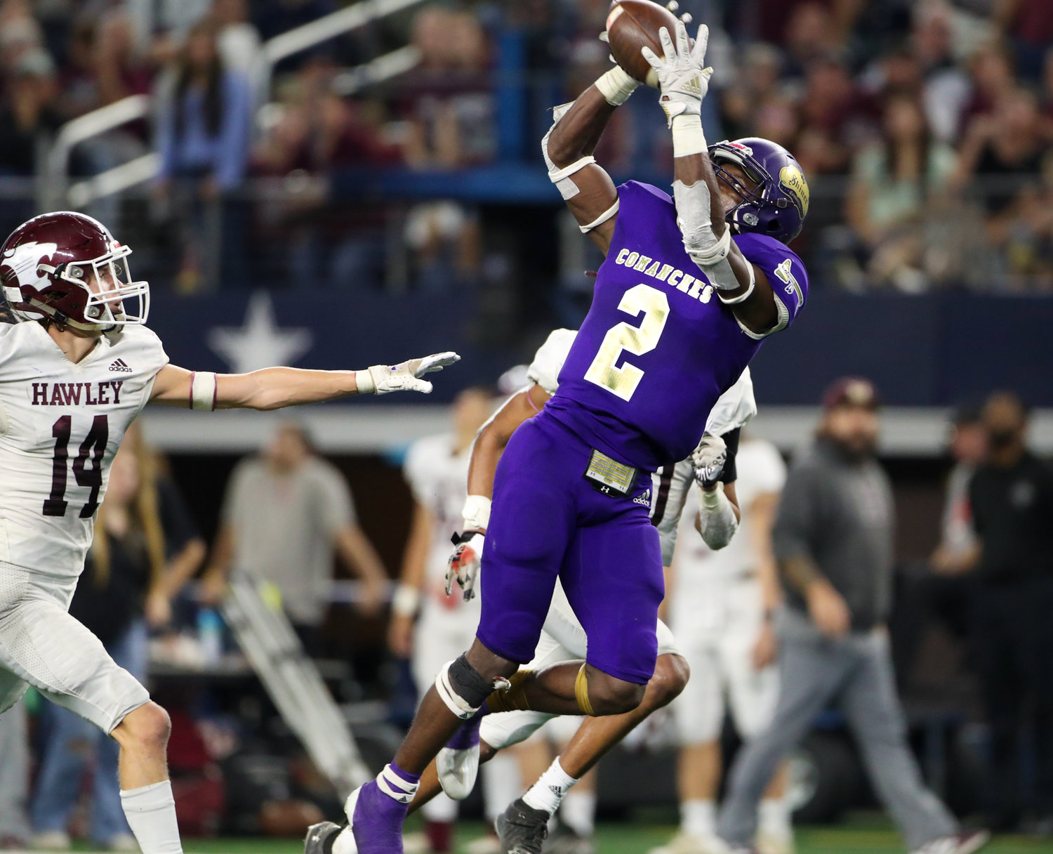 Shiner Comanches junior Dalton Brooks (2) brings in a pass during the Class 2A Division I state football championship game between Shiner and Hawley on December 15, 2021 in Arlington, Texas.
