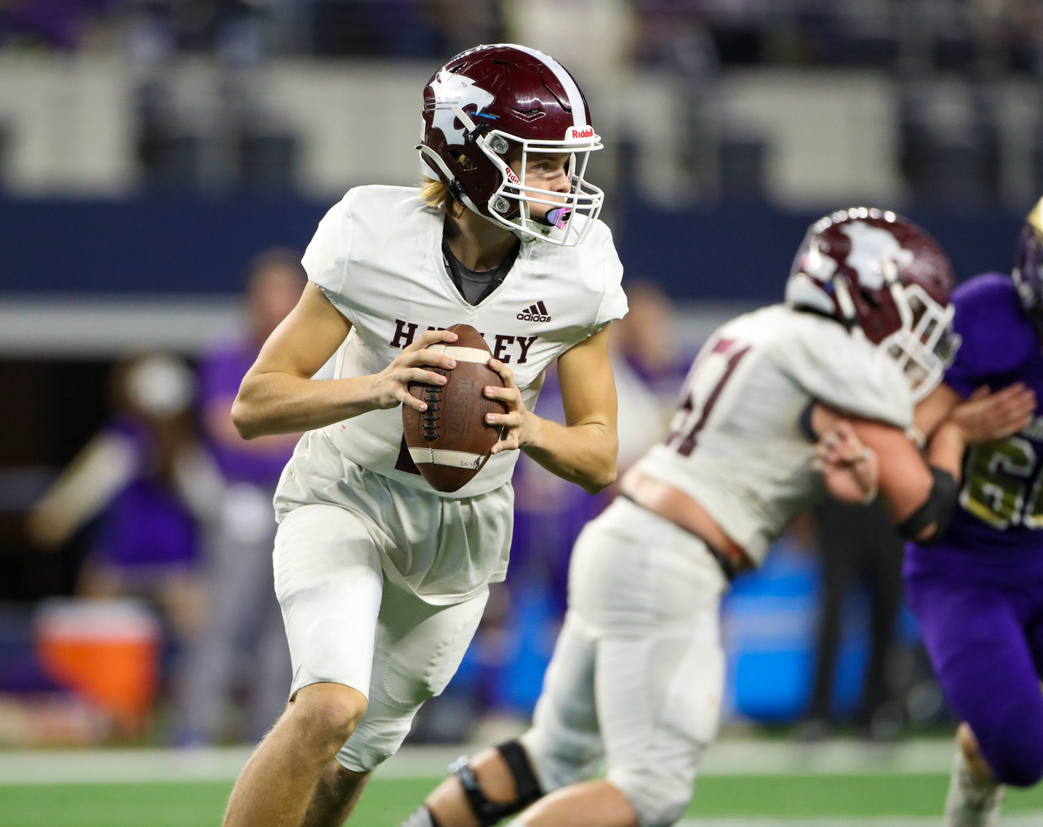 Hawley Bearcats junior Rodey Hooper (2) rolls out looking to pass during the Class 2A Division I state football championship game between Shiner and Hawley on December 15, 2021 in Arlington, Texas.