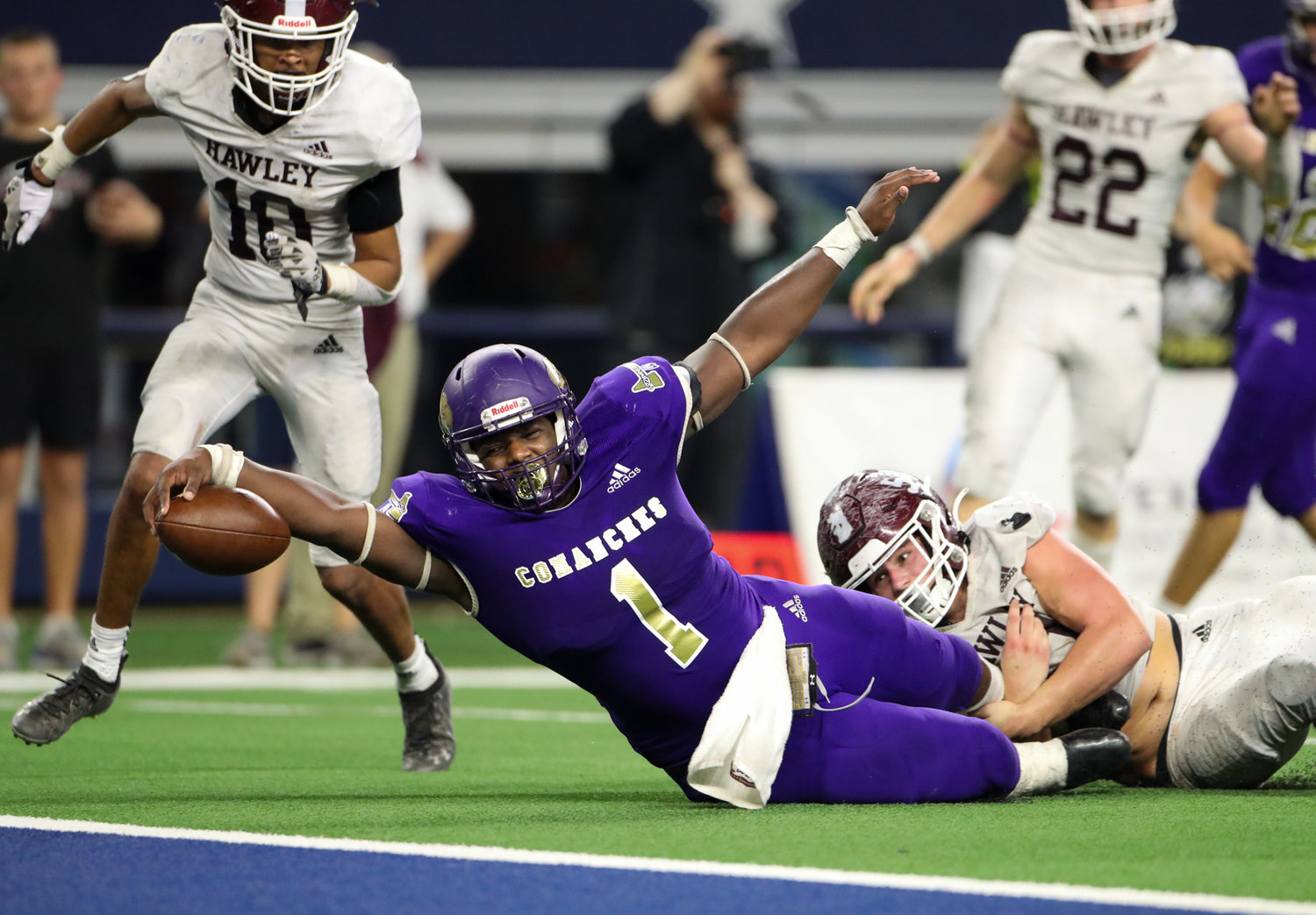 Shiner Comanches senior Doug Brooks (1) is ruled down short of the goal line during the Class 2A Division I state football championship game between Shiner and Hawley on December 15, 2021 in Arlington, Texas.