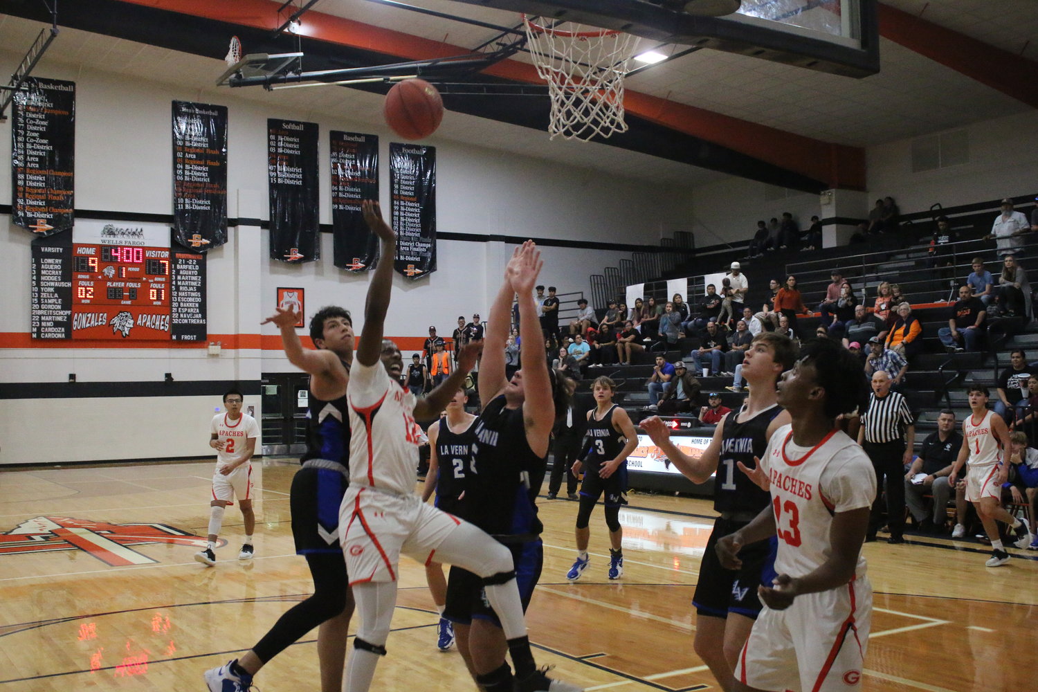 Gonzales’ Jeremiah Hastings gets fouled as he goes up for a shot against La Vernia on Tuesday, Feb. 1. Hastings made the shot and the ensuing free throw to put the Apaches up, 12-7. Gonzales would win the game, 63-57, to get payback against the Bears for an earlier loss.