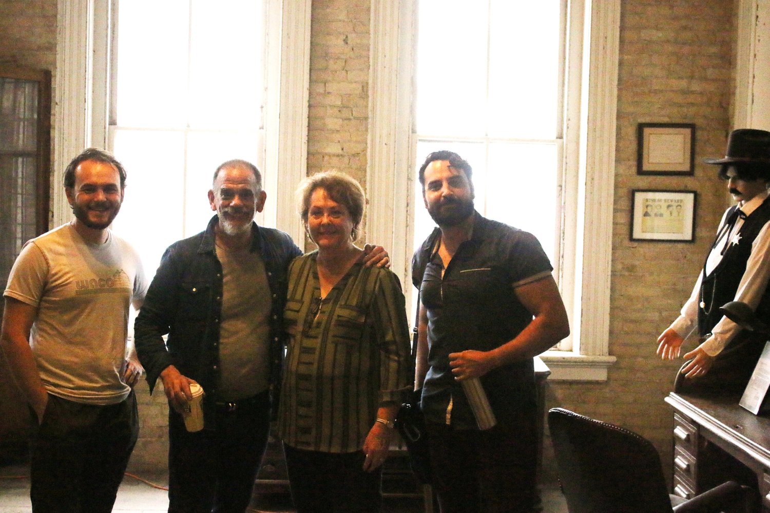 Actor and director Jon Chardiet, second from left, and members of his Texas crew, Max Wright, far left, and Stephen Pinkston, far right, met with Gonzales Jail Museum director Sandra Wolff to tour the old jail and scout places to film his upcoming Western, which will be shot on location from April 25-27.