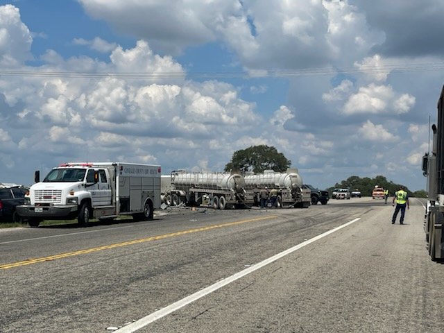 A Bastrop woman was killed and her husband injured when her GMC Denali was struck by a tractor-trailer on US 183 at the intersection with FM 2067 on Friday, Aug. 26.
