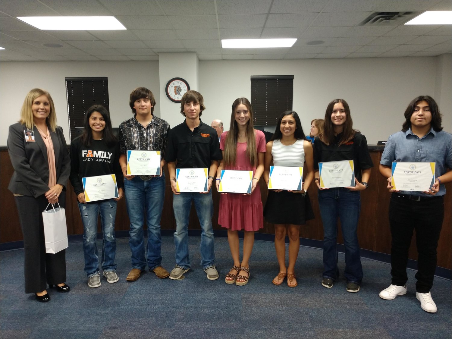 Eleven Gonzales High School students receives special recognition from the school district for their participation in the GHS Virtual Exchange Project: Mishima, Japan in Monday, Aug. 29 school board meeting,: Left to Right: GISD Student Servces Robin Trojcak and GHS students, Bella Aguero, Coy LaBuhn, Cooper LaBuhn, Ainsley Holub, Yesenia Melchor, Kilee Schwausch and Aiden Noyola. NOT PICTURED: Kayleigh Fridrich, Emily Hull, Carlee Ramos and Dakota Schmidt.