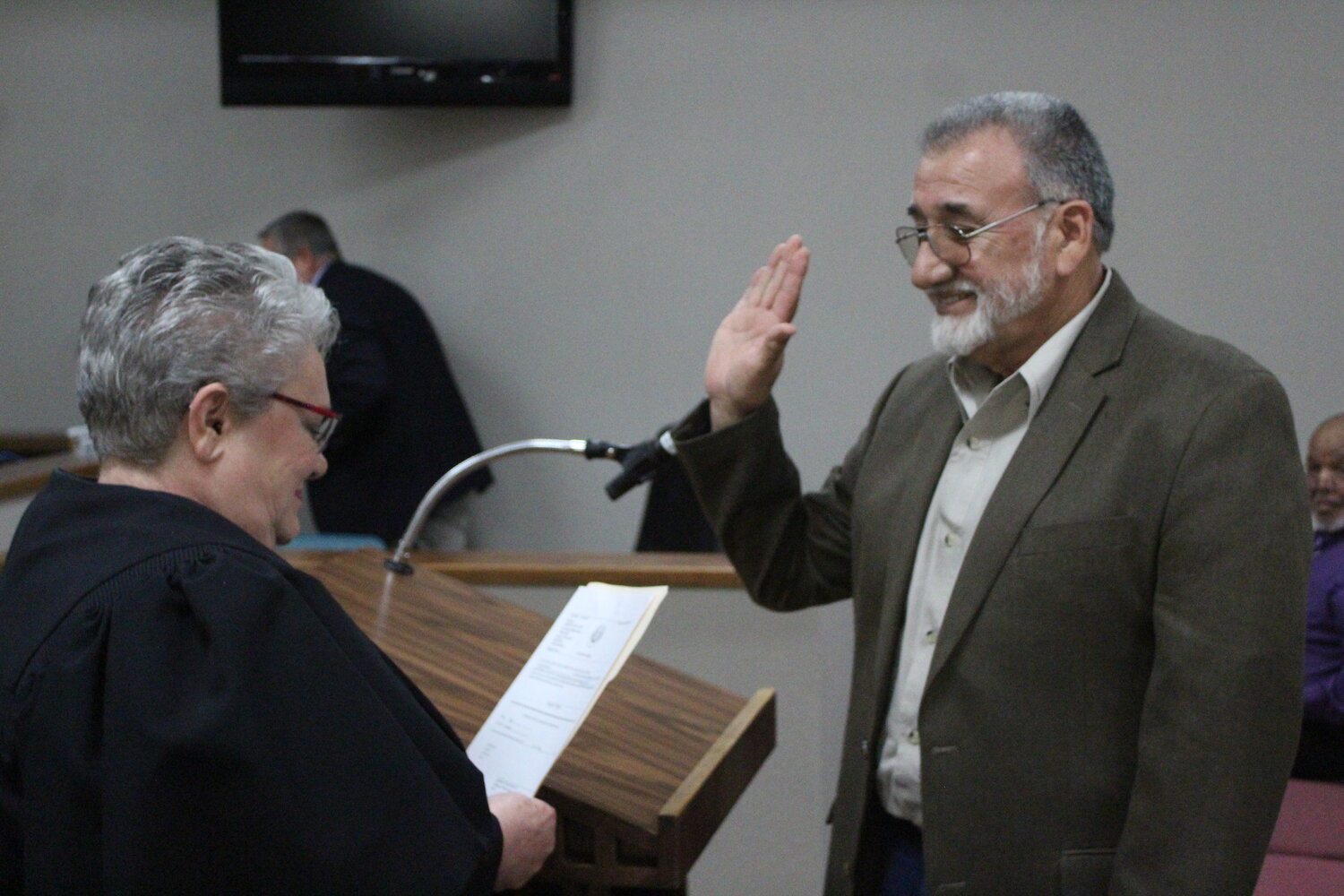 Gonzales Justice of the Peace Deidra Voigt swears in new Gonzales Councilmen Lorenzo Hernandez of District 3 Thursday, May 11.