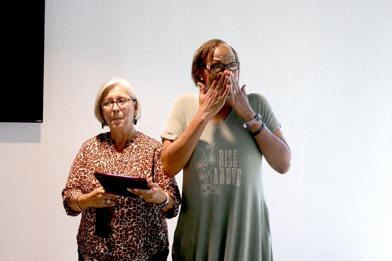 Delores Perales, right, is overcome with emotion on Monday, June 5, as Nixon Mayor Dorothy Riojas presents her with a plaque honoring her late sister Mary Ann Fatheree, who served as a Nixon City Council member until her passing in January 2023.