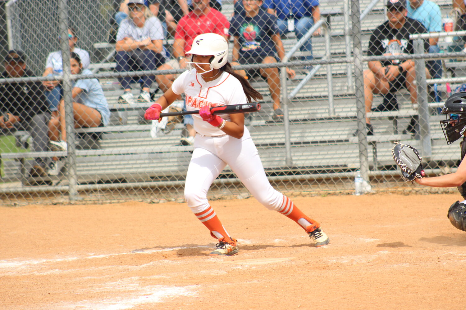 Sophomore Ava Carrizales (2) at bat for the Lady Apaches against La Vernia in district opener Tuesday, March 12.