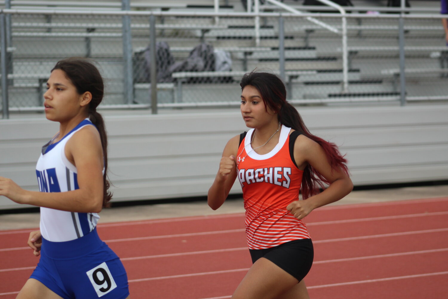 Lady Apaches’ Marianelly Martinez runs in the 1600m race at the Cuero meet.