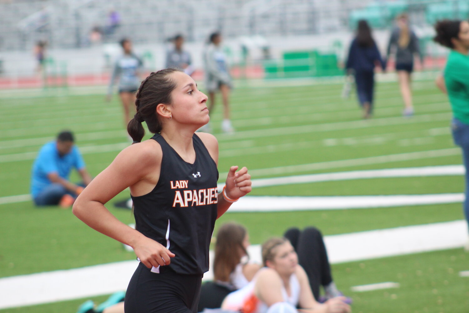 Lady Apaches’ Jordyn Gonzales competes in the 1600m race at the Cuero meet.