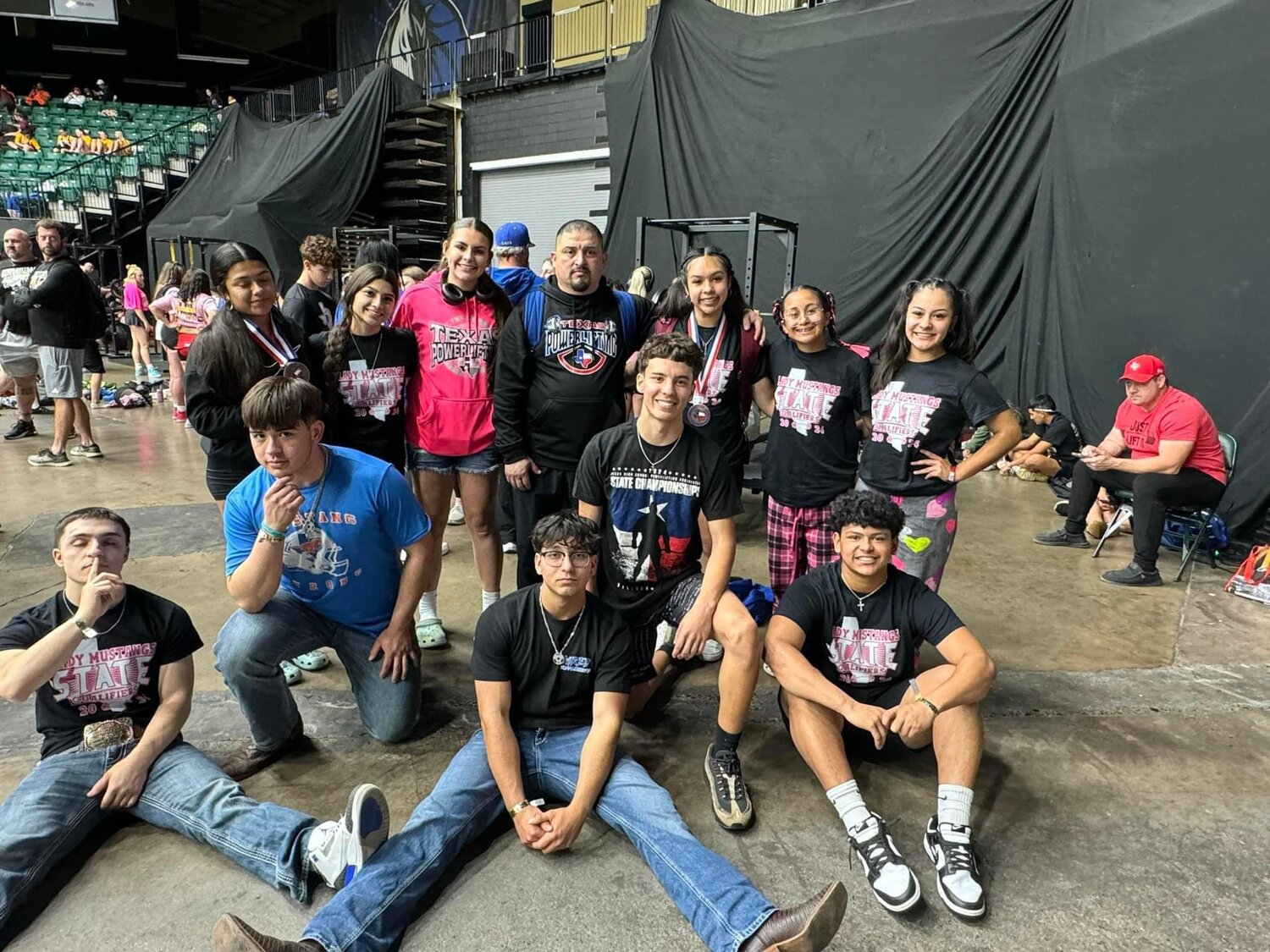 The Nixon-Smiley Powerlifting teams together at the THSWPA state powerlifting meet in Frisco Thursday, March 14. Both powerlifting teams are coached under Eliseo Cano.