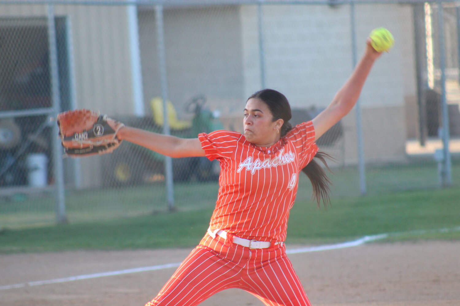 Lady Apaches senior pitcher Haley Cantu (4) pitches the first four innings against the JFK Lady Rockets Thursday, March 28.