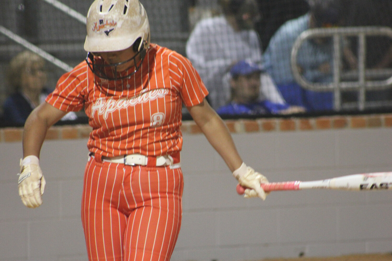 Lady Apaches freshmen Alexis Hernandez (8) at bat for Gonzales in the second district meeting against the La Vernia Lady Bears.