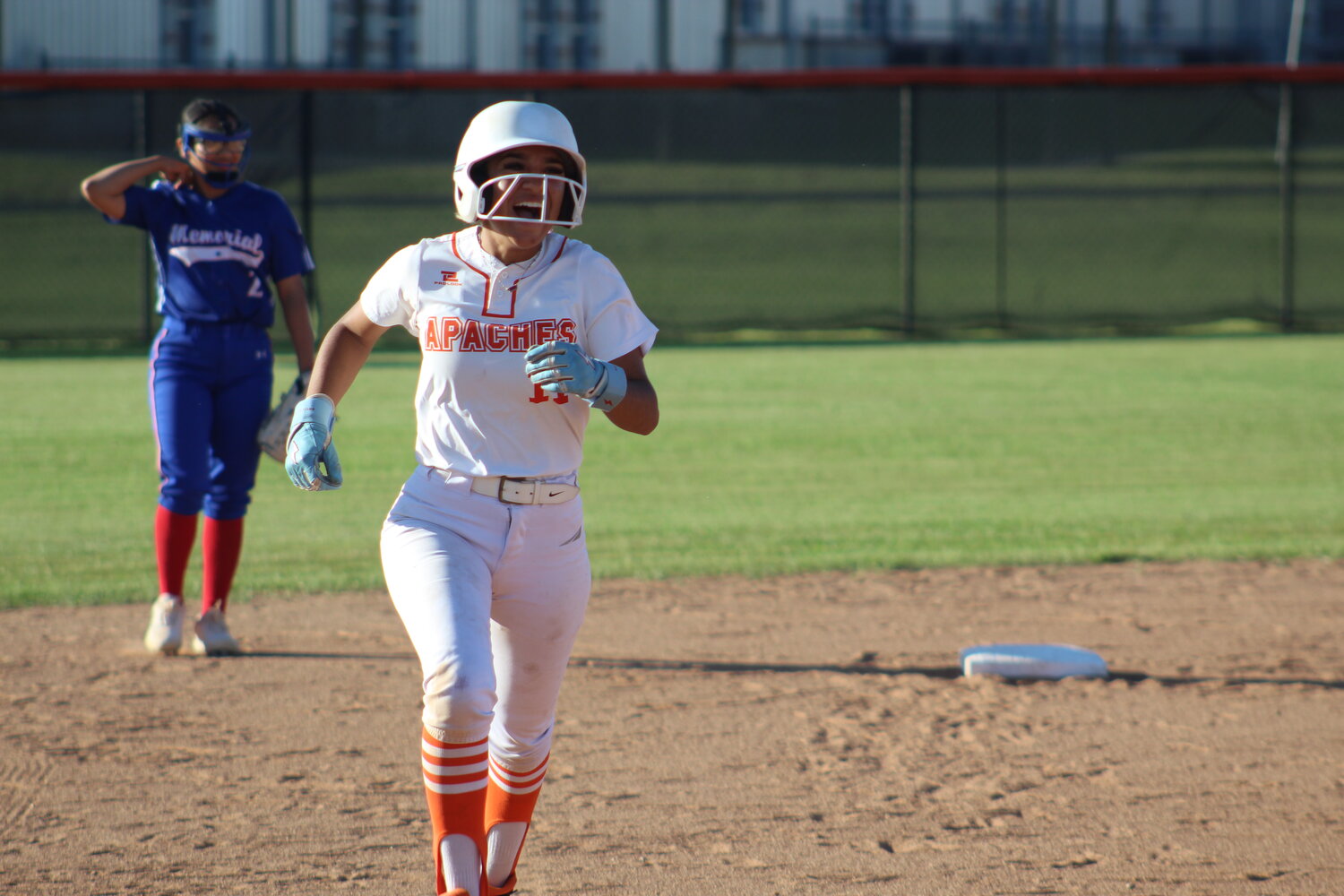 Lady Apaches Gyzelle Guevara (11) runs around the bases for a solo home run against San Antonio Memorial Friday, Guevara recorded two home runs in the, 16-1, win over Memorial Friday, April 5.