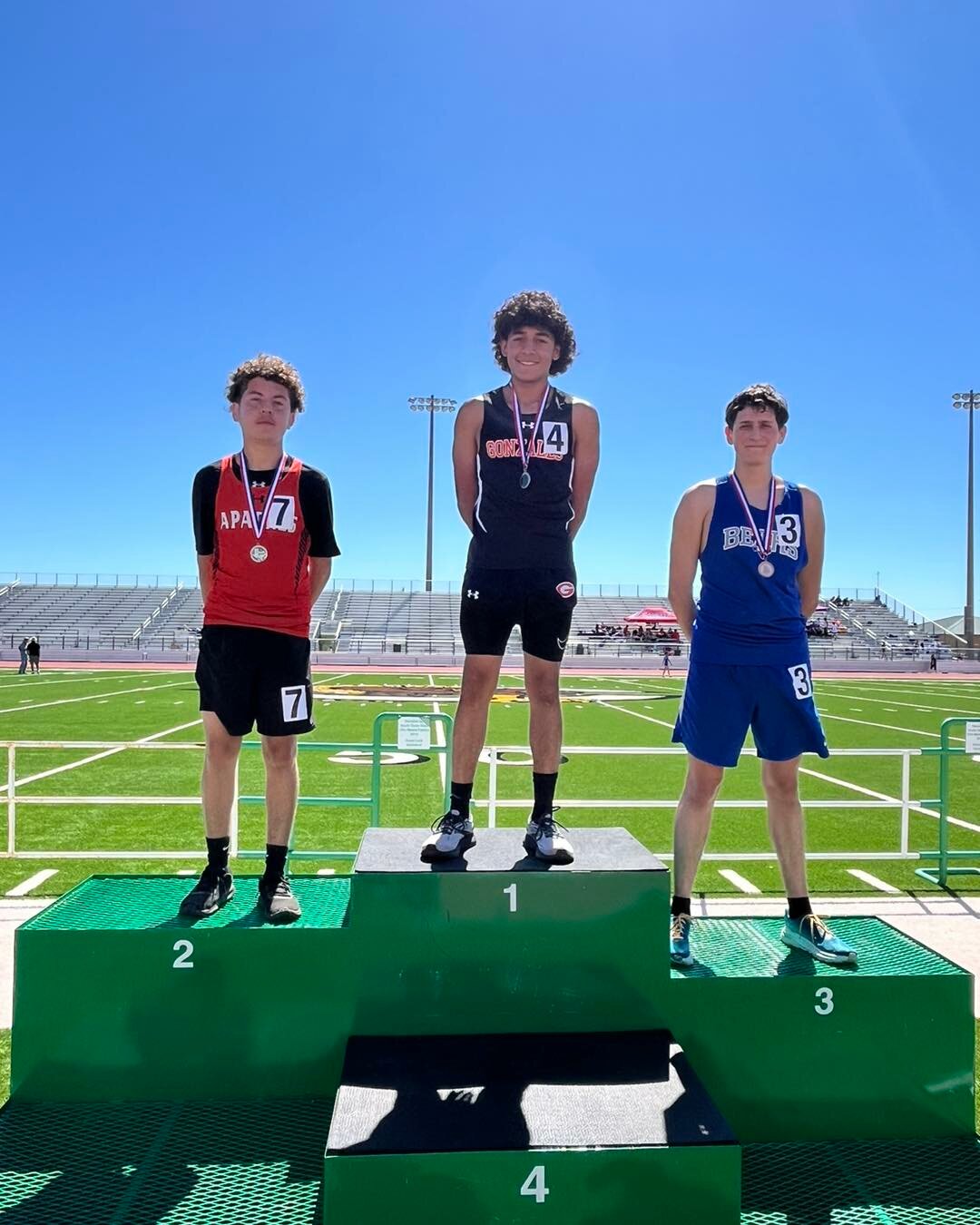 Ckristopher Ramos (4,district chamipion) and Youahi Huerta (7, district runner-up) at the podium with their medals and clinched a spot in the area meet in 3200m run.