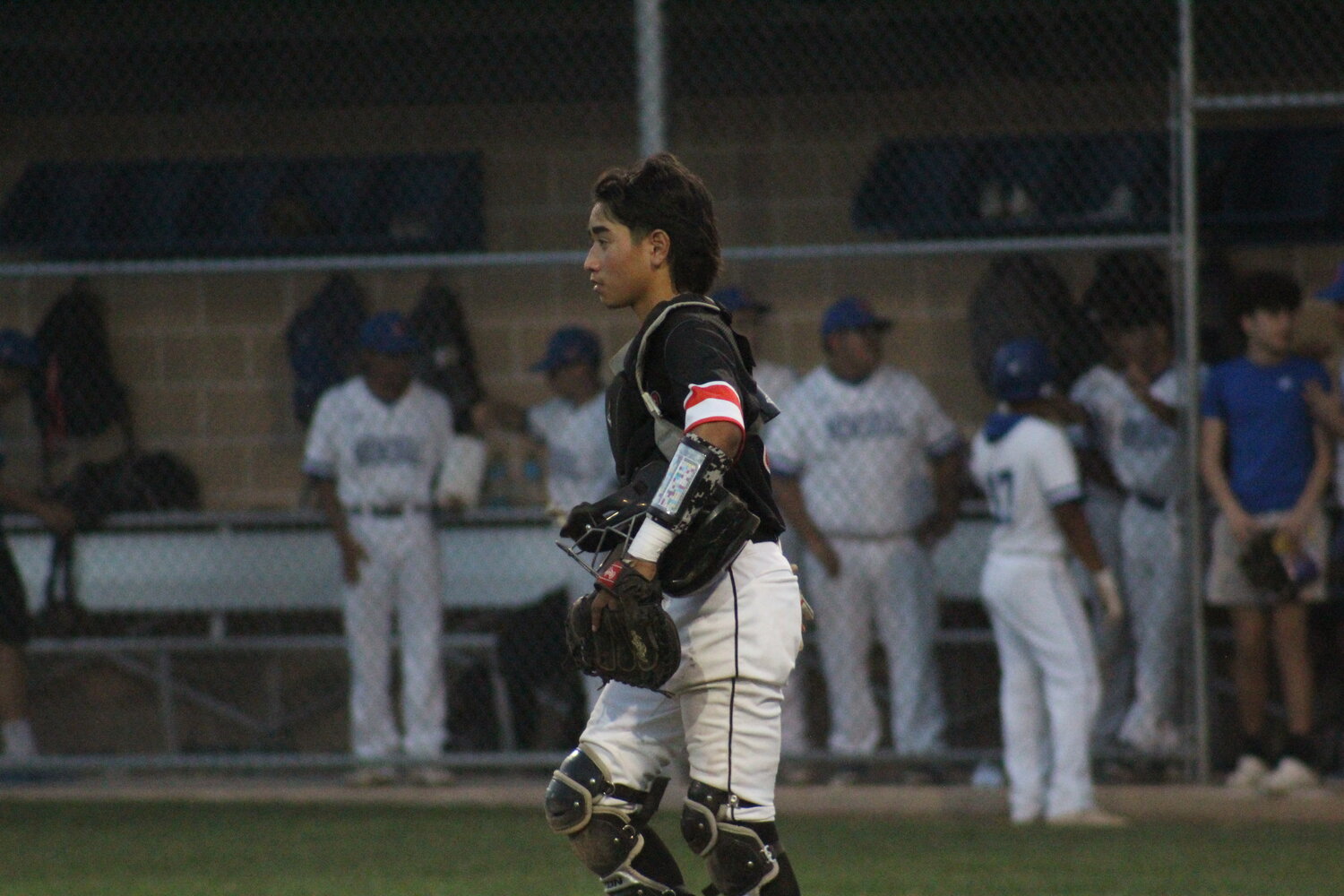Apaches freshman catcher James Sanchez (6) walks to the pitchers mound in the San Memorial match Tuesday, April 9.