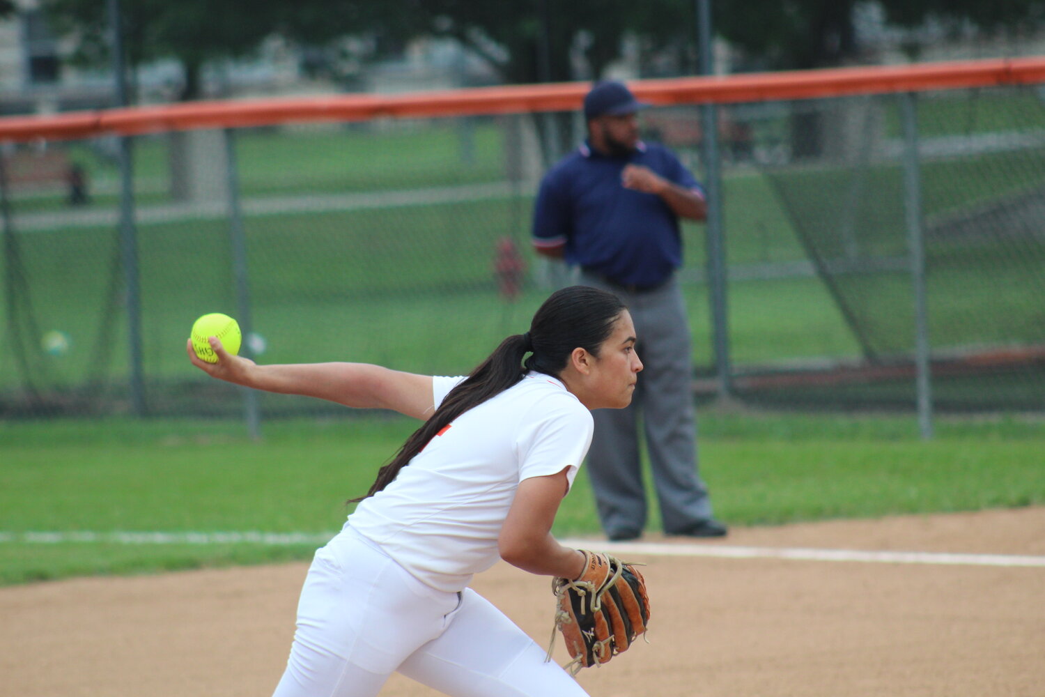 Haley Cantu (4) winds up a pitch against San Antonio JFK Tuesday, April 16.