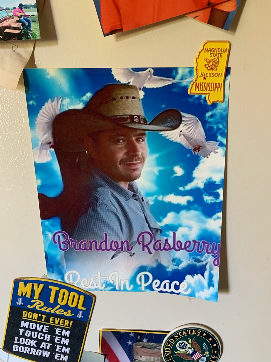 This photo of Brandon Rasberry stays on Laura Fontenot’s refrigerator as a constant reminder of her beloved nephew and the promise she made not to stop looking for his killer.