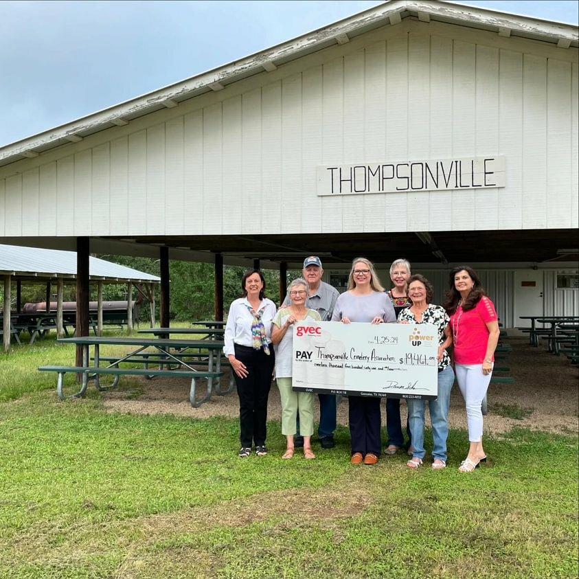 The Thompsonville Cemetery Association, Thompsonville, accepts a GVEC Power Up grant for $19,461. The grant will be used to improve their multi-purpose Community Center. Pictured L to R: Thompsonville Ladies Club Secretary Tessa Goodman, Thompsonville Cemetery Association President LaVerne Davis, Thompsonville Cemetery Association Board of Directors Larry Hamm, GVEC External Review Committee Member Crissy Filla, Thompsonville Cemetery Association Board of Directors Nanette Monaghan, Thompsonville Cemetery Association Treasurer Betty Schroeder, and Thompsonville Ladies Club Member Cheri Willard.