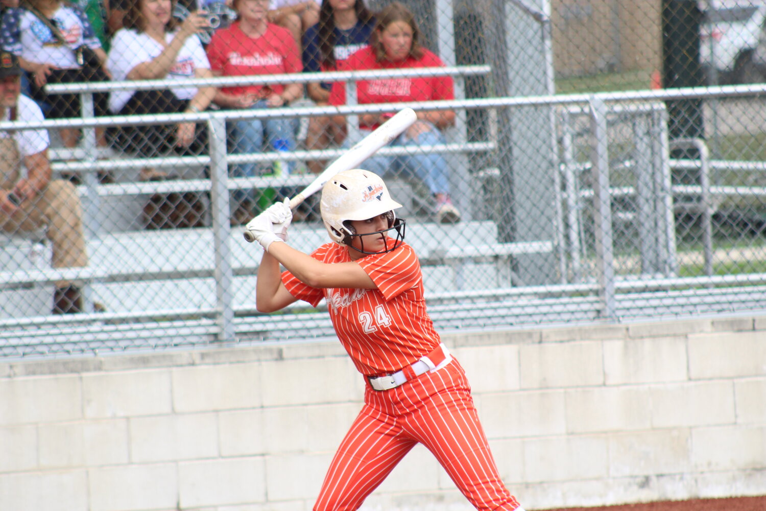 Lady Apaches senior outfielder Kelly 
Breitschopf (24) at bat for Gonzales in game two in the Wimberley bi-district series