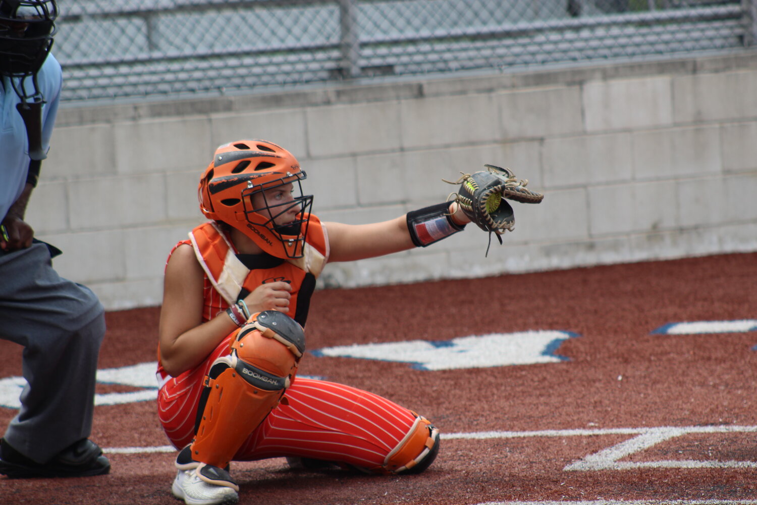 Lady Apaches senior catcher Sydney McCray (3) catches a pitch from pitcher Dixie Rae Lester (10).