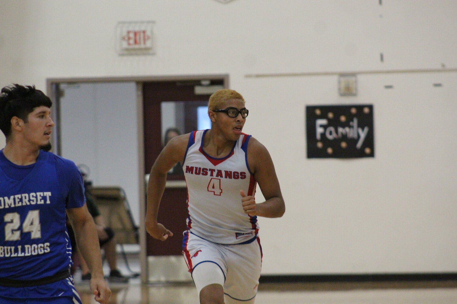 Mustangs senior Carl White runs down the court for the East team in the STCA All-Star Boys Basketball game in Floresville Saturday, May 18.