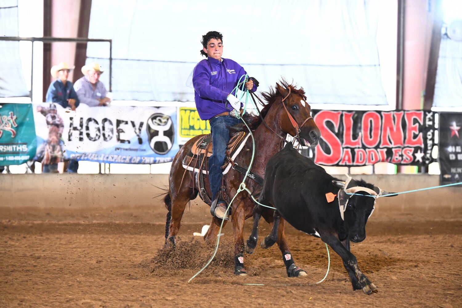 Buck Garza competes in the team roping competition for the Texas High School Rodeo Association.