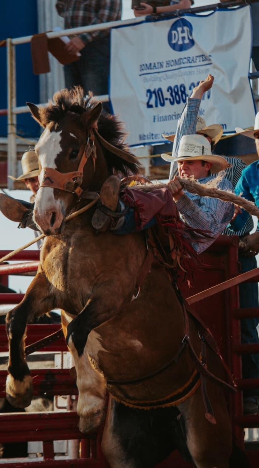 Sutton Albert on his horse for the saddle bronc competition. Albert enters the Texas High School Rodeo Finals as the Region 6 winner for the saddle bronc competition.