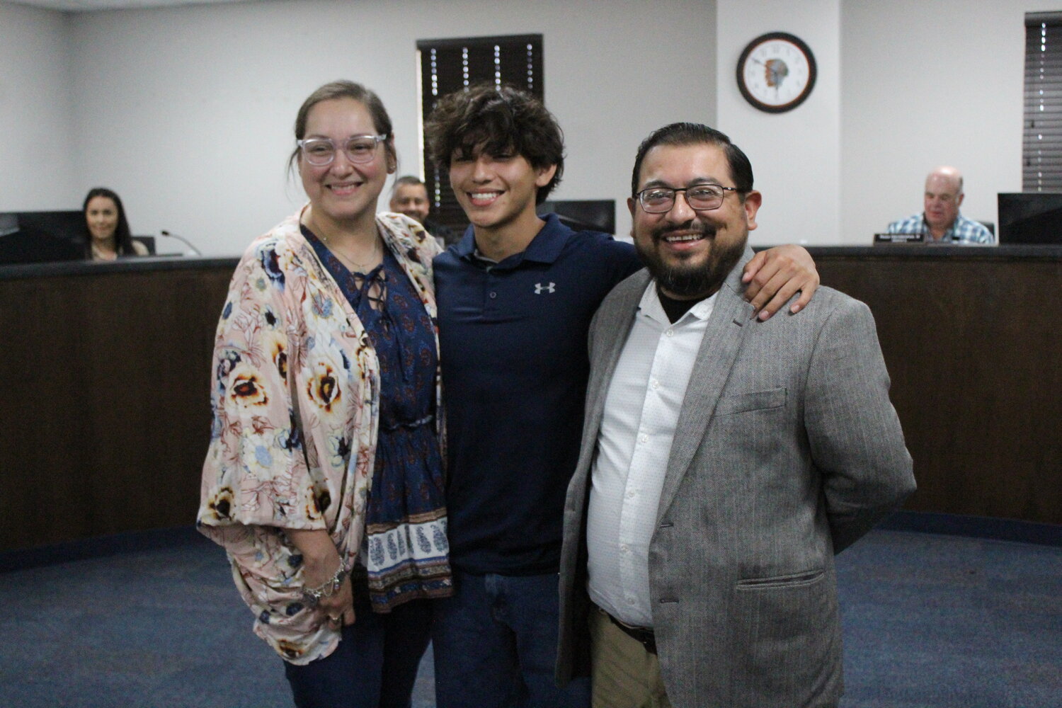 Richard Varela (right) with his family at the Monday, June 24 Gonzales ISD school board meeting. Varela was named the new Gonzales High School band director; he was previously the band director of Cuero High School.