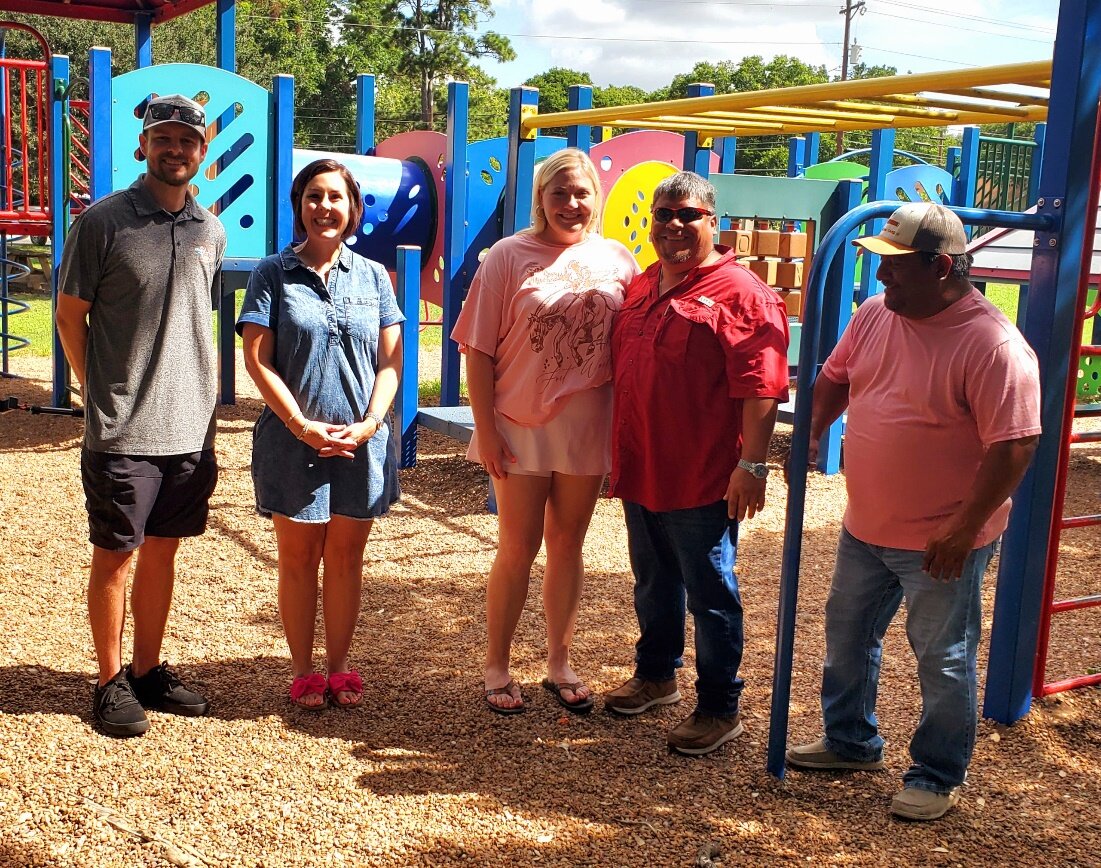 Making final plans for the Lions Park Playscape are, from left, Payton Newton (Fab Playground Specialist) Britney Caka (GNLC Foundation Treasurer), Garen Reese (Lions Club Playground Committee Chair), Ralph Camarillo and David Cantu (City of Gonzales). Not pictured is Cindy Rodriguez (GNLC Foundation President)