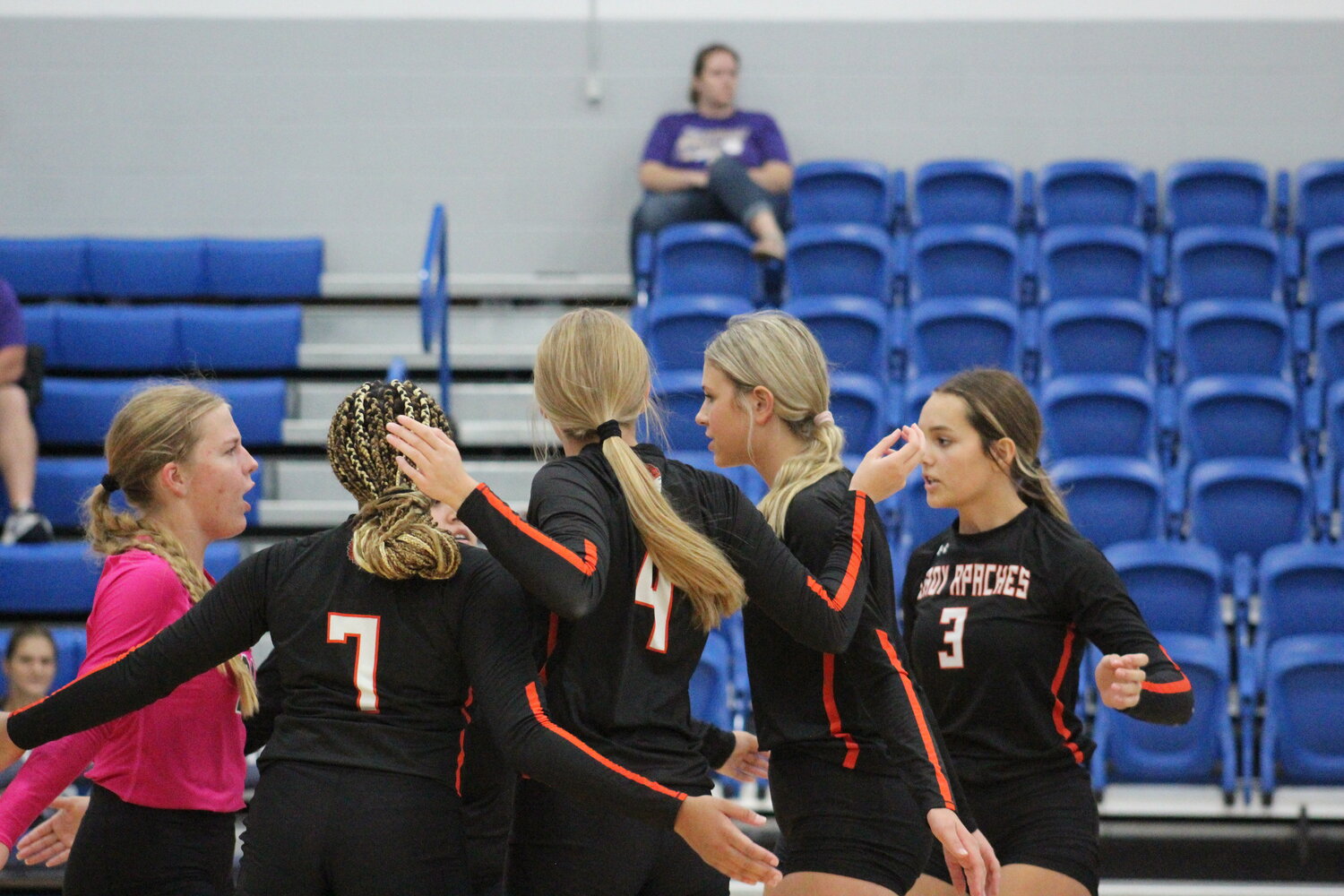 The Lady Apaches celebrate a point on Shiner in the dual season opener at Yoakum High School Tuesday, Aug. 13.