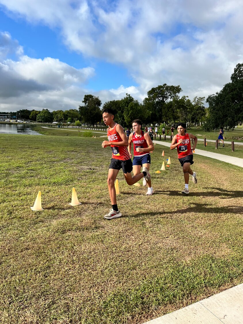 Members of the Gonzales Apaches cross-country team running in the Lockhart meet Saturday, Aug. 31.