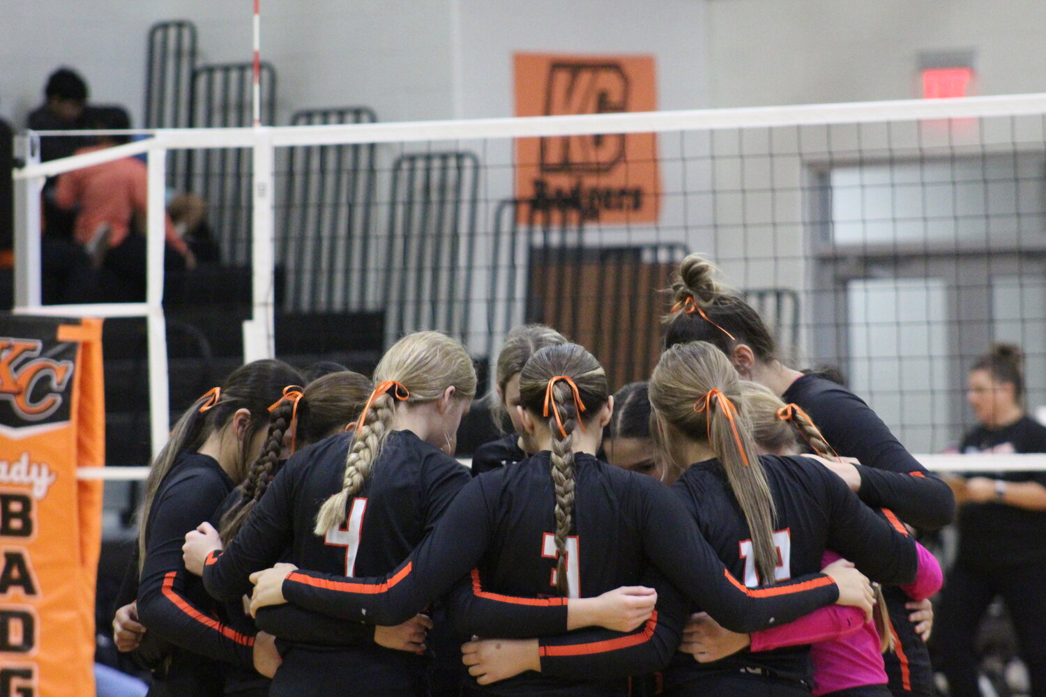 The Gonzales Lady Apaches huddle up before the start of the Karnes City match Tuesday, Sept. 24.