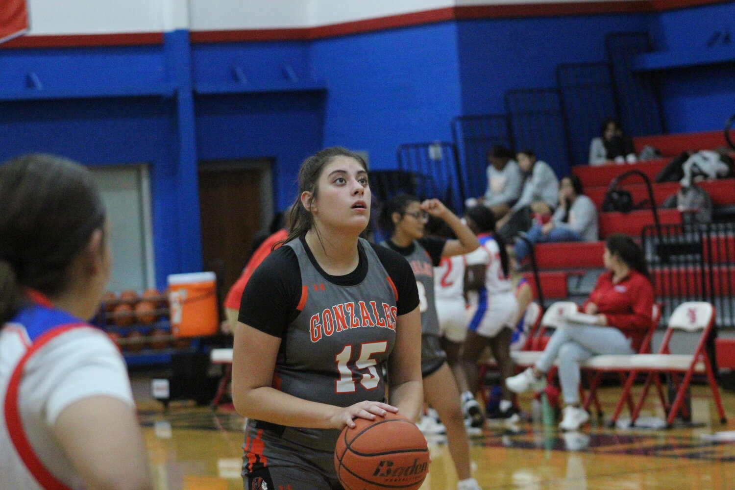Junior Isabella Ikard (15) shoots two free throws in the game against Nixon-Smiley early this season. Ikard recorded 13 rebounds in the win against Giddings Tuesday, Dec. 10.