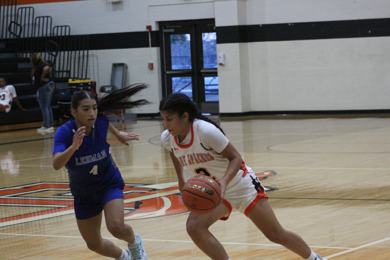 Senior Bella Aguero (2) dribbles the ball past a Lehman defender early this season. Aguero scored 11 points in the win over the Giddings Lady Buffaloes Tuesday, Dec. 10.