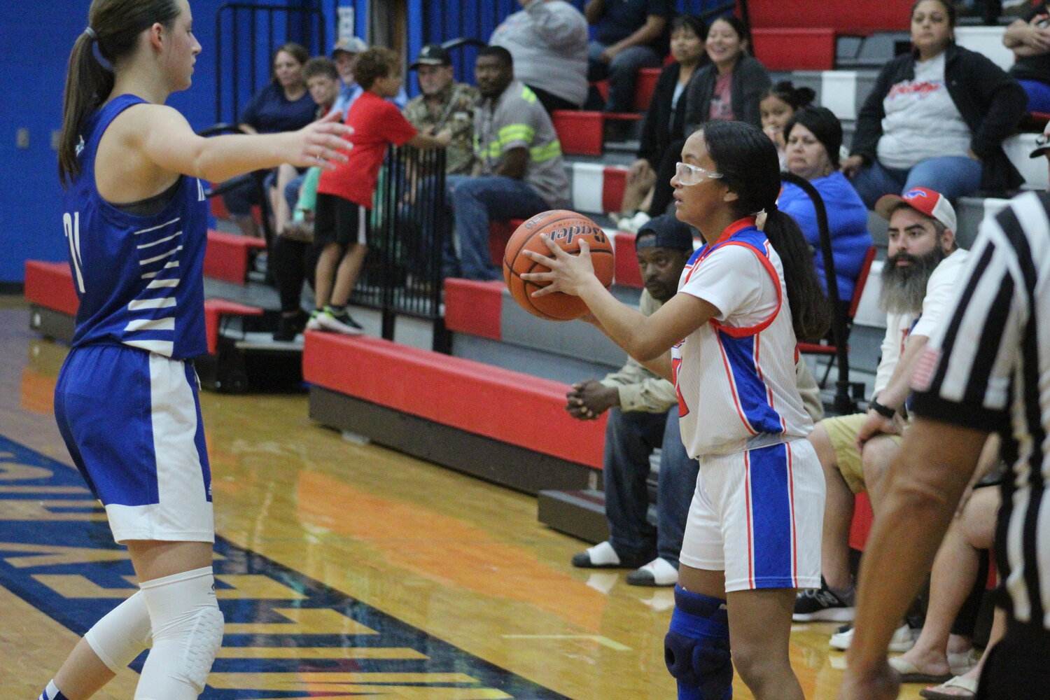 Lady Mustangs sophomore point guard Grace Gomez (10) with the ball for Nixon-Smiley’s offensive possession against Fall City early this season.