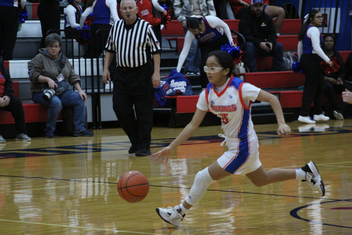 Lady Mustangs sophomore guard Grace Gomez (10) dribbles the ball down court for Nixon-Smiley.