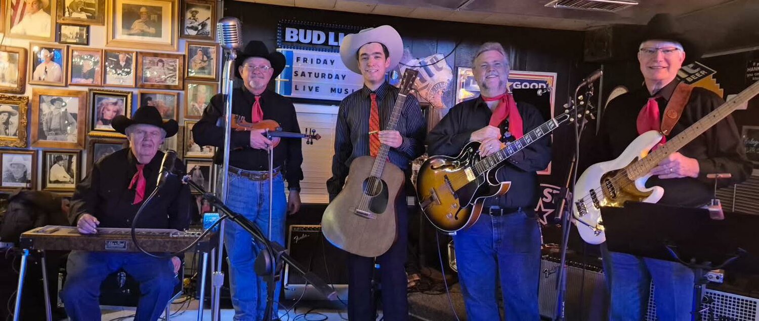 Members of Wyatt Aleman and The Texas Range Cowboys include, rom left, Roger Edgington on steel guitar; Scott Moon on fiddle; Wyatt Aleman on guitar and fiddle; Howie Douthey on electric guitar; and Jimmie Bolado on bass. Not pictured is Phillip Telford on drums.