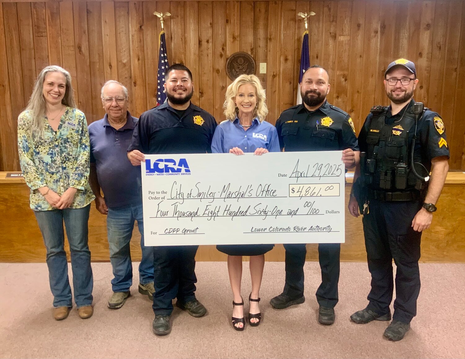 LCRA representatives present a $4,861 grant to the City of Smiley Marshal’s Office for new safety equipment. The grant is part of LCRA’s Community Development Partnership Program. Pictured, from left to right, are: Elizabeth Ehlers, LCRA Regional Affairs representative; Ellis Villasana, mayor pro tem; Jason Criollo, deputy marshal; Margaret D. “Meg” Voelter, LCRA Board member; Jason Torres, city marshal; and Mark Valli, corporal.