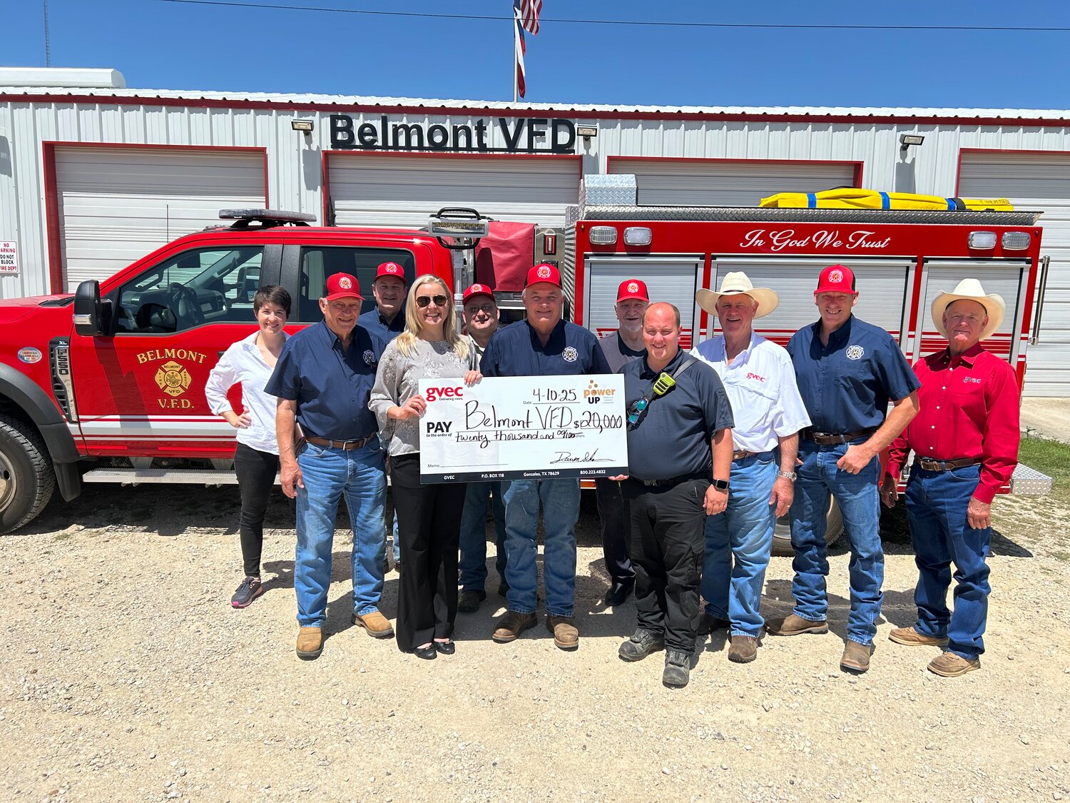 The Belmont Volunteer Fire Department accepts a GVEC Power Up grant for $20,000. They will use the grant to install a 29,000-gallon water storage tank, doubling capacity to strengthen emergency response efforts. Pictured L to R: Secretary Tina Mailhot-Roberge, Treasurer Kenneth Schauer, Firefighter John Thomsen, GVEC Economic Development & Community Relations Director Daisy Scheske Freeman, Assistant Fire Chief Jay Tinsley, Fire Chief Brian Schauer, Firefighter Cecil Deadman, Vice President and Training Officer Michael Burkhart, GVEC Board Vice President Henry “Bubba” Schmidt Jr, Firefighter Neil Henze and GVEC Board Secretary Treasurer Morris Harvey.