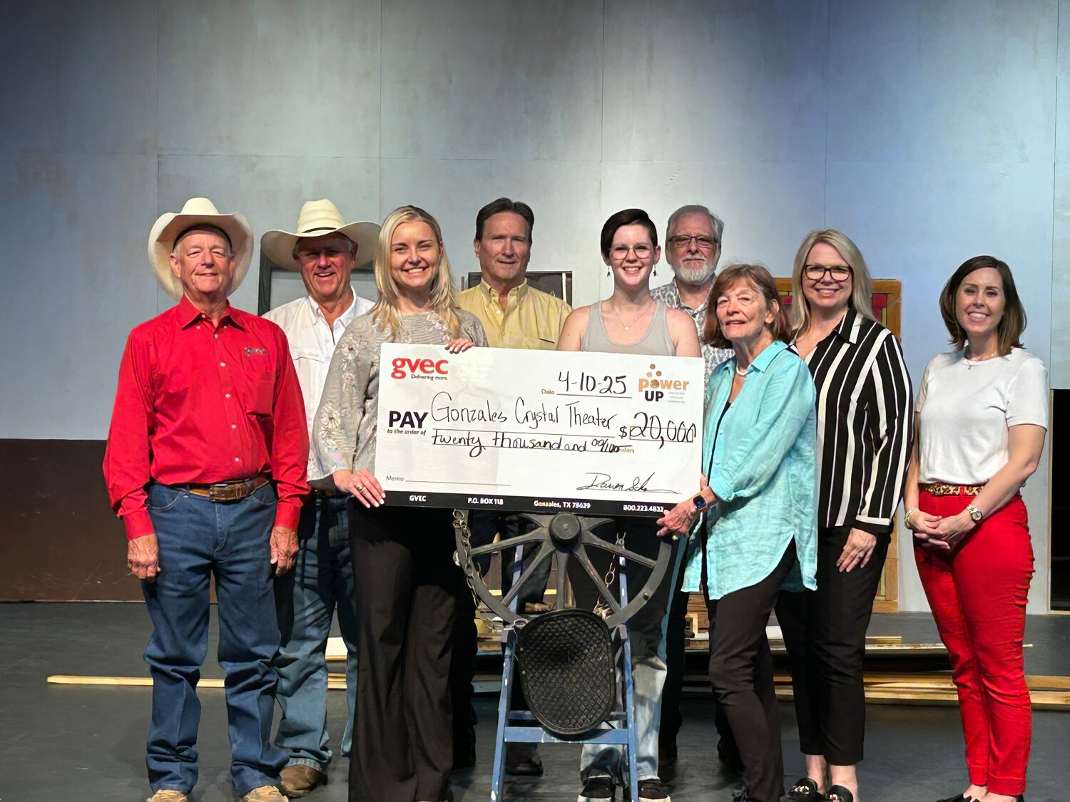 The Gonzales Crystal Theater, Inc. accepts a $20,000 GVEC Power Up grant to improve stage safety, backstage comfort and upgrade aging materials. Pictured L to R: GVEC Board Secretary Treasurer Morris Harvey, GVEC Board Vice President Henry “Bubba” Schmidt Jr, GVEC Economic Development & Community Relations Director Daisy Scheske Freeman, Tim Gescheidle, Participant Lena Marie Salazar, Gary Gage, President Barbara Crozier, Crissy O'Neal and Britney Caka.