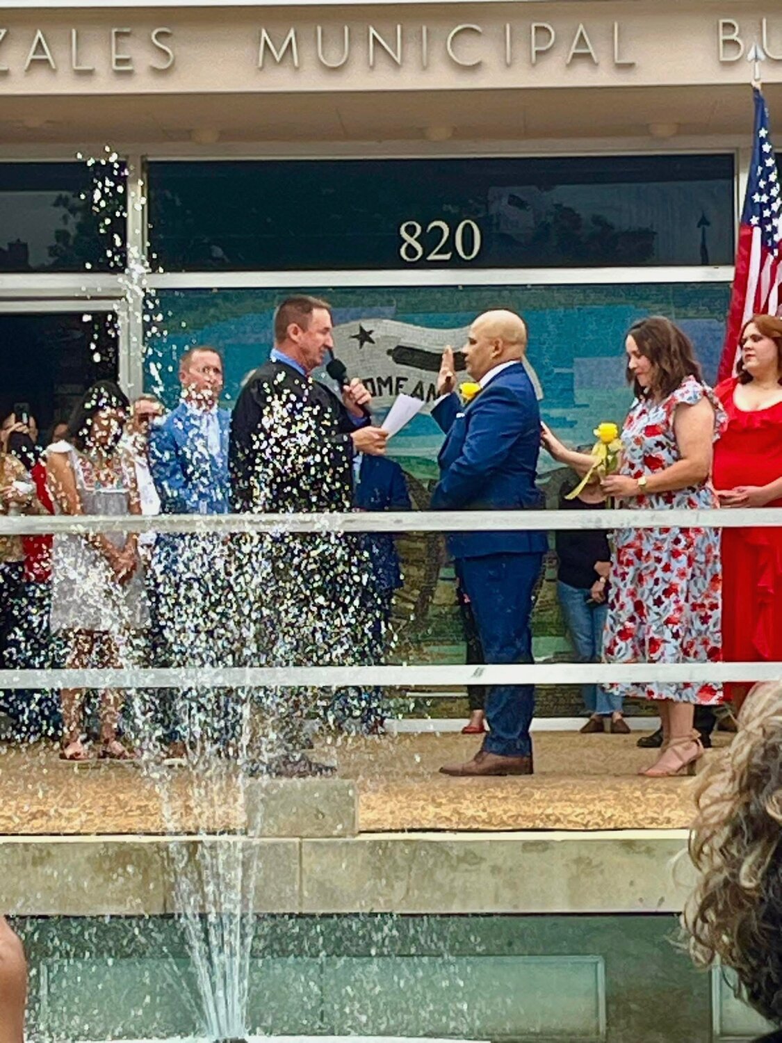 County Judge Pat Davis swears in new Gonzales Mayor Isaac Anzaldua during the regular Gonzales City Council meeting at City Hall on Thursday, May 8.