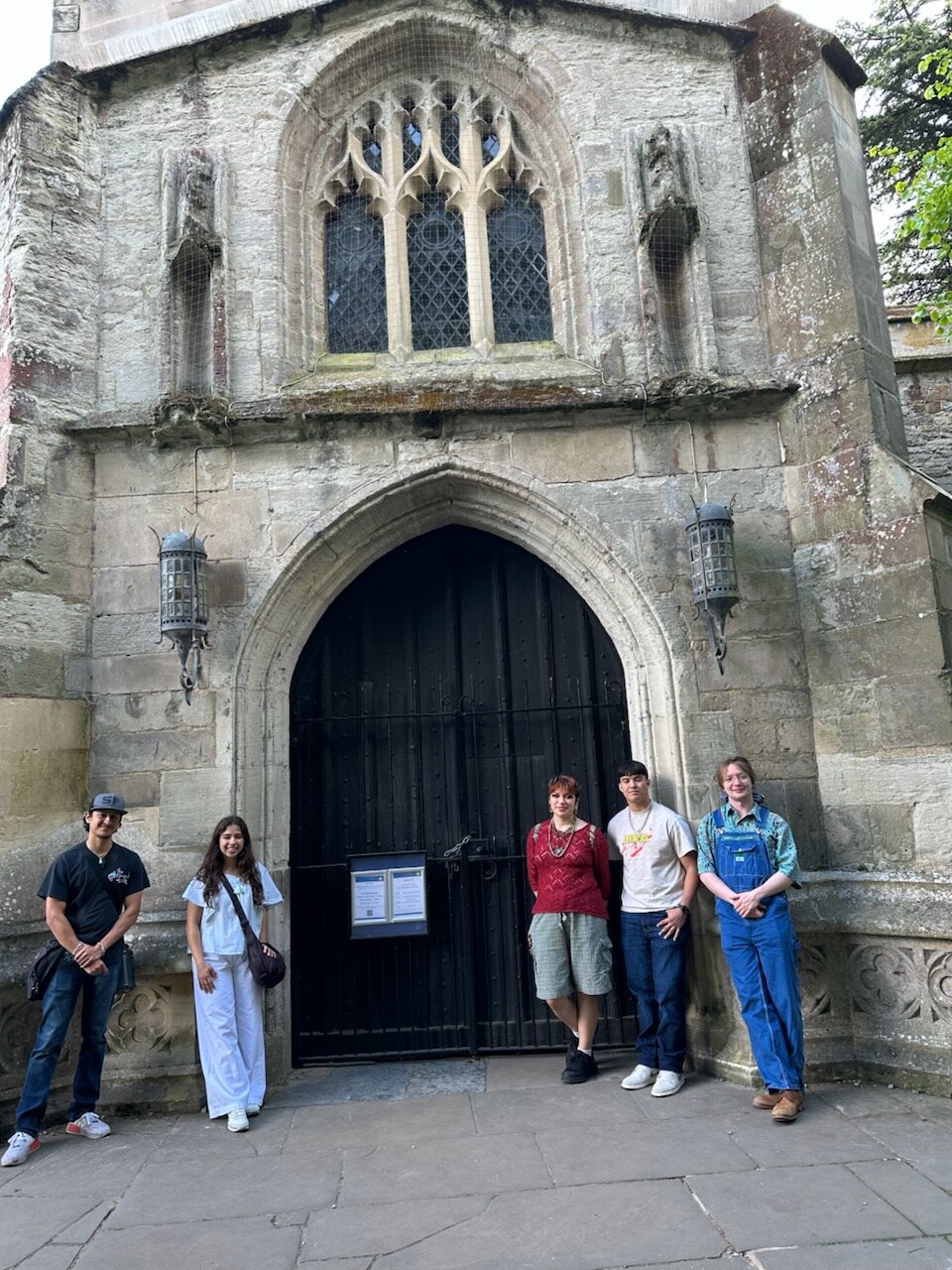 The graduate Crystal Shakespeare Ninjas in front the Trinity Church where Shakespeare is interred in Stratford-on-Avon, UK.