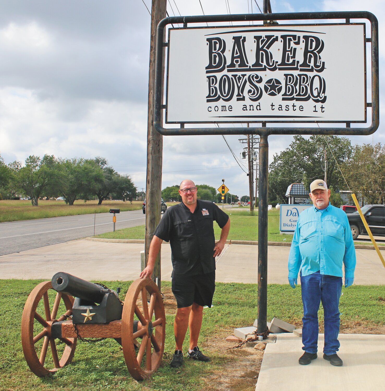 Wayne Baker and his father, Phil, who passed away in 2023, stand in front of the sign to Baker Boys BBQ, the barbecue joint they started together in Gonzales in 2015. The restaurant celebrates its 10th anniversary this year as well as its third time being honored by Texas Monthly magazine for its food. After making the Top 50 in 2017 and 2021, the restaurant placed in the Top 100 for 2025.