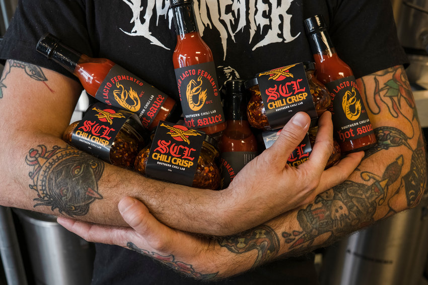 Southern Chili Lab's first two products on the market: a fermented hot sauce and chili crisp. The products are available at retailers around Baldwin County and can be ordered from the Southern Chili Lab website.