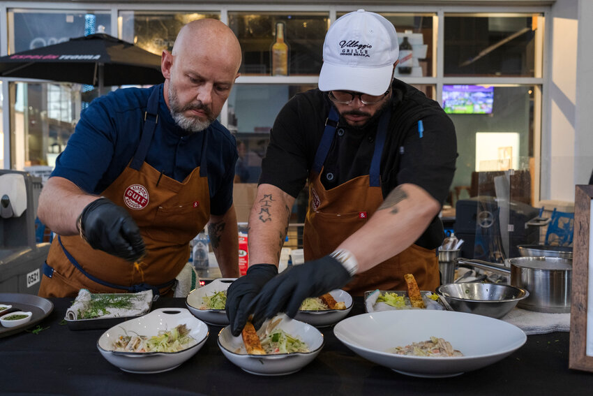 Laurence Agnew of Villaggio Grille at The Wharf, competes in the 2024 Alabama Seafood Cook-Off at The Wharf.